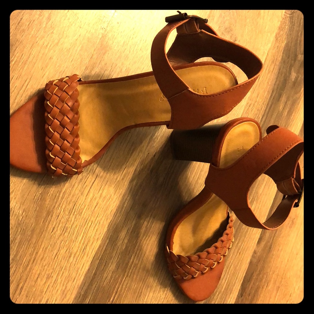 Cute light brown block heel sandal.